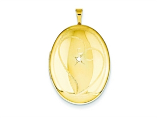 The impressive 1/20 Gold Filled 20mm Diamond in Heart Oval Locket - Chain Included, crafted in 14 kt Yellow Gold Filled. This beautiful design is mounted with 1 stone pave set Round Brilliant Diamond G color I1 clarity. This design measures 20.00 mm wide,