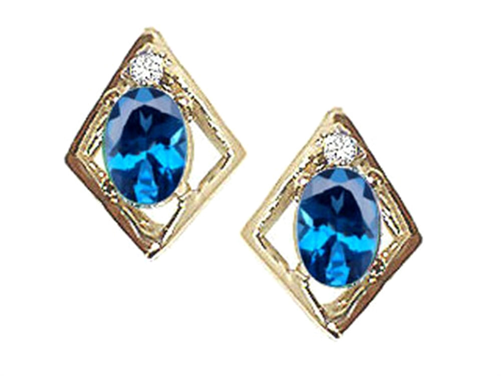 Tommaso Design™ Oval 6x4mm Genuine Blue Topaz Earrings
