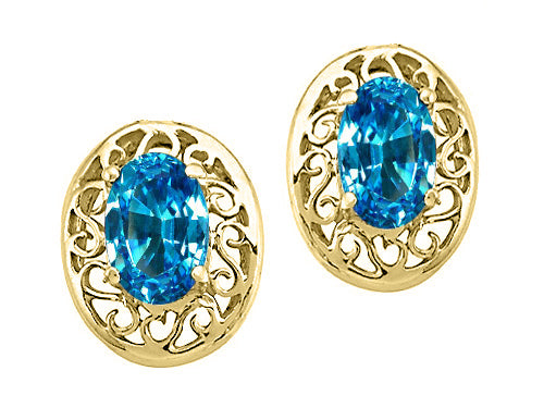 Tommaso Design™ Oval 6x4mm Genuine Blue Topaz Earrings
