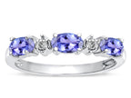 Tommaso Design™ Oval 5x3mm Genuine Tanzanite three stone oval band