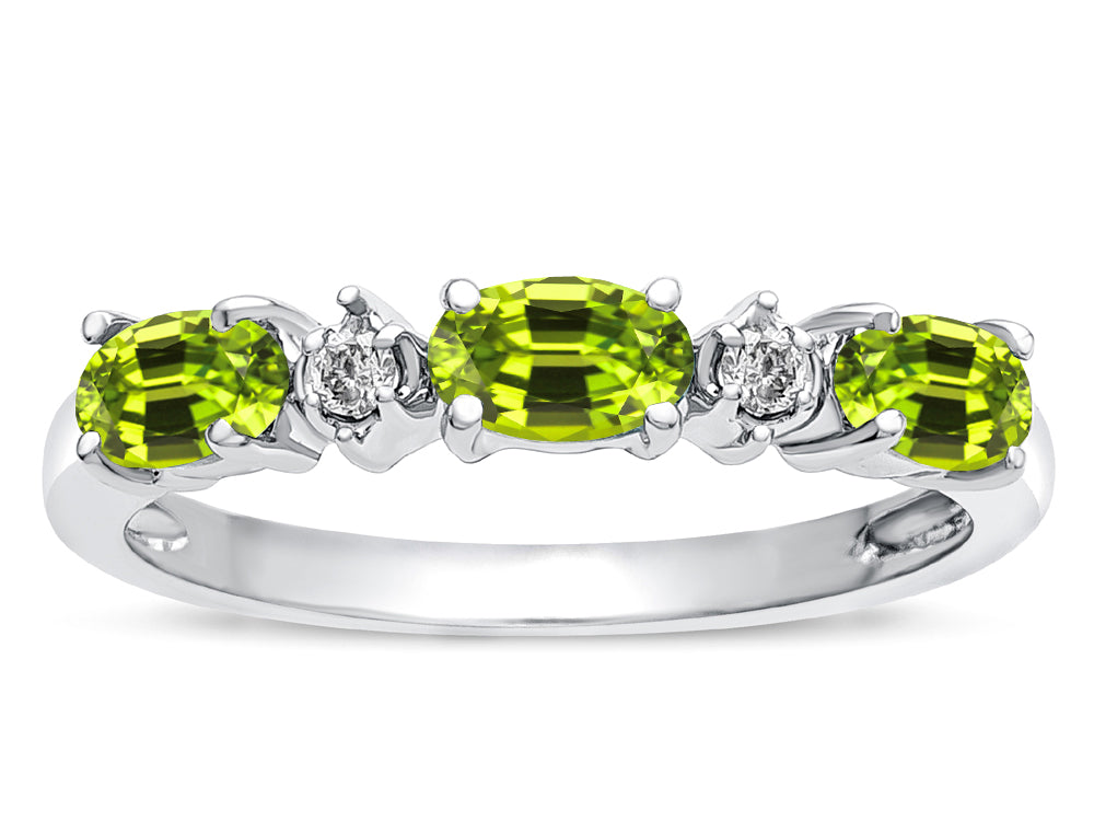 Tommaso Design™ Oval 5x3mm Genuine Peridot three stone oval band