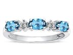 Tommaso Design™ Oval 5x3mm Genuine Blue Topaz three stone oval band