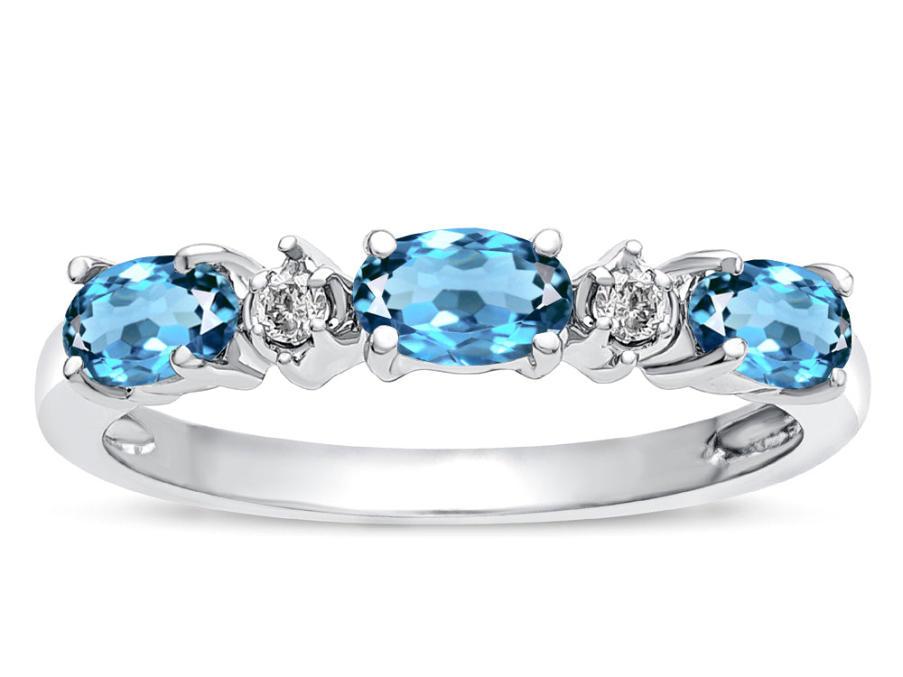 Tommaso Design™ Oval 5x3mm Genuine Blue Topaz three stone oval band