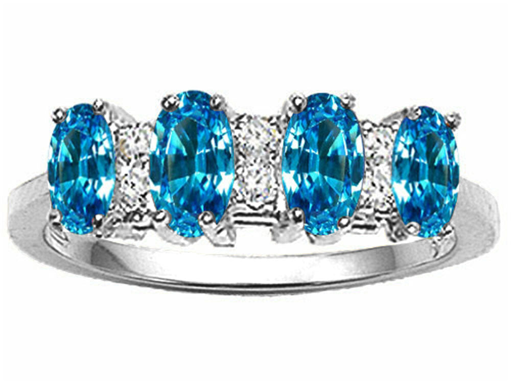 Tommaso Design™ Oval 5x3mm Genuine 4 Stone Blue Topaz Band