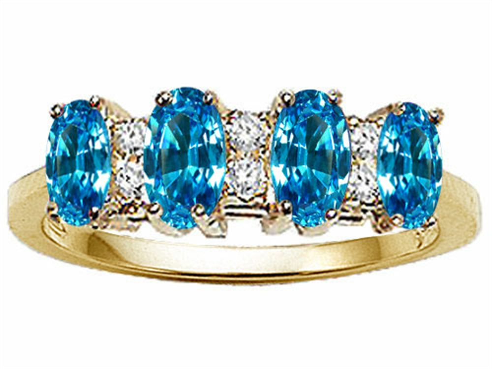 Tommaso Design™ Oval 5x3mm Genuine 4 Stone Blue Topaz Band
