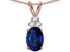 Star K™ Classic Oval 8x6mm Created Sapphire Rabbit Ear Pendant Necklace