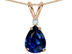 Star K™ Pear Shape 8x6 mm Created Sapphire Rabbit Ear Pendant Necklace