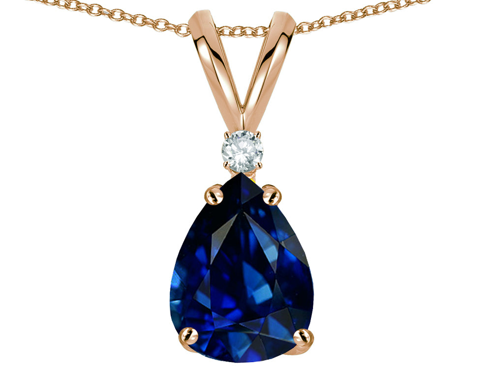 Star K™ Pear Shape 8x6 mm Created Sapphire Rabbit Ear Pendant Necklace