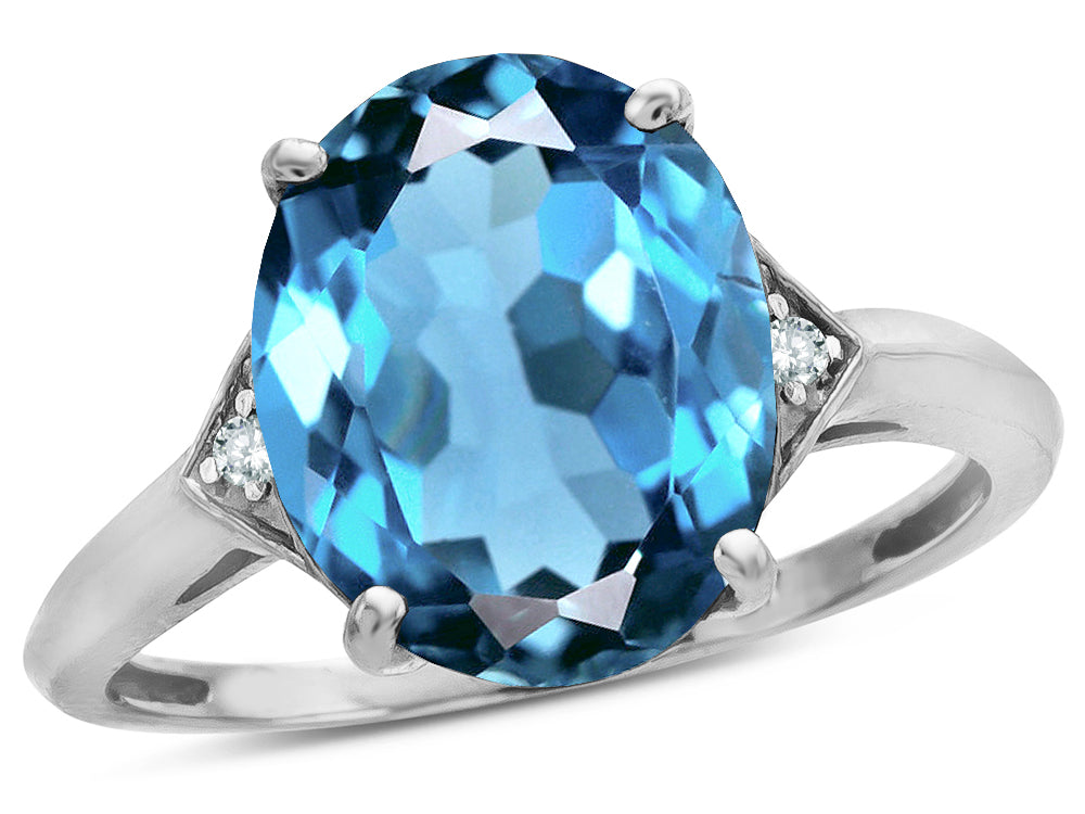 Tommaso Design Large Oval 12x10 Blue Topaz 3 Stone Trillion Setting Ring