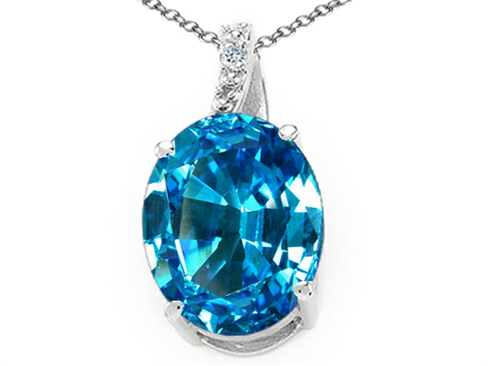Tommaso Design™ Oval 9x7mm Genuine Blue Topaz and Diamond Pendant Necklace