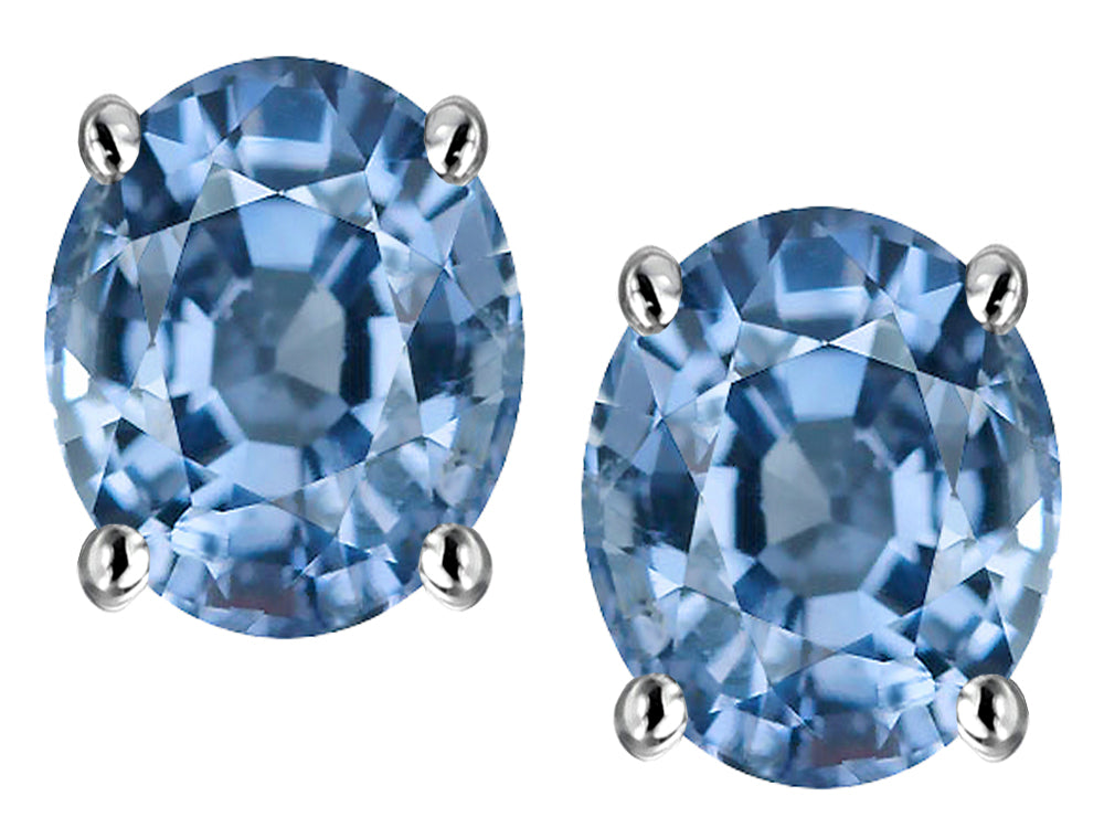 Star K™ Oval 8x6mm Simulated Aquamarine Earrings Studs