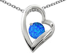Star K™ 7mm Round Blue Created Opal Pendant Necklace