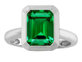 Star K 9x7mm Emerald Cut Octagon Solitaire Ring With Simulated Emerald