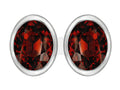 Star K™ 8x6mm Oval Simulated Garnet Earrings Studs