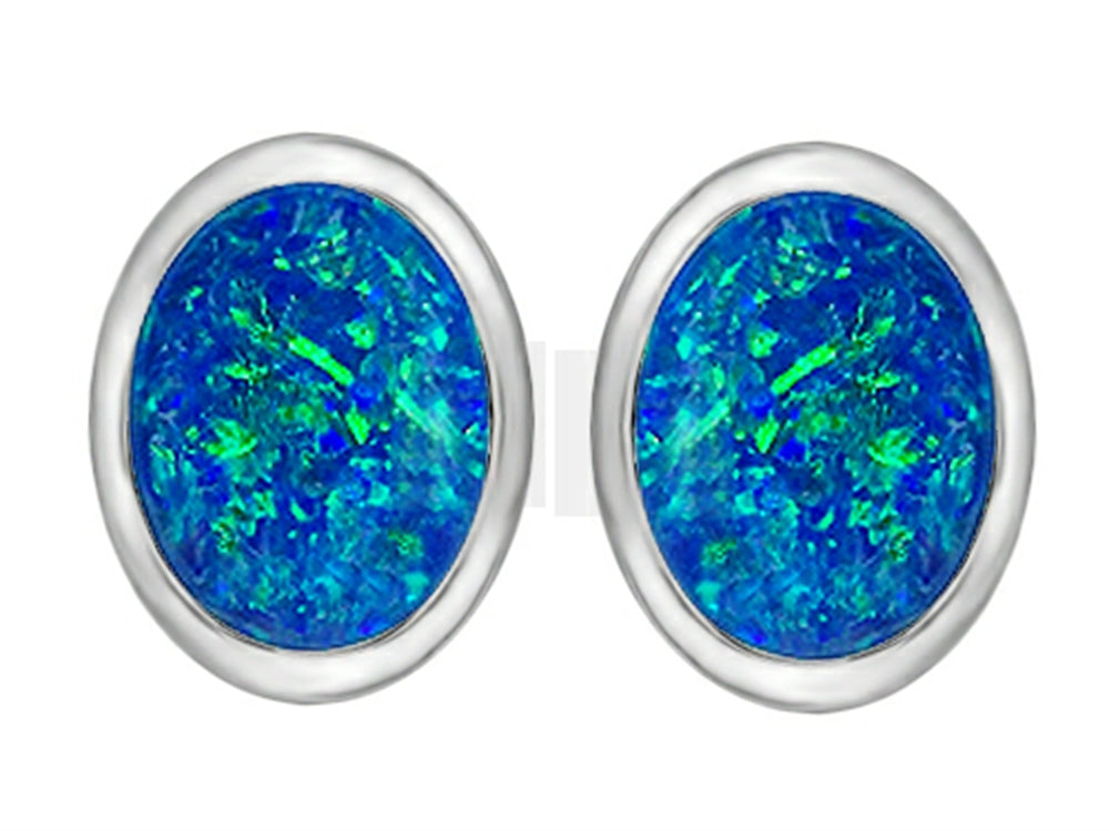 Star K™ 8x6mm Oval Blue Created Opal Earrings Studs