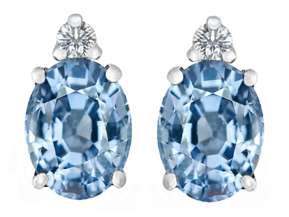 Star K™ 8x6mm Oval Simulated Aquamarine Earrings Studs
