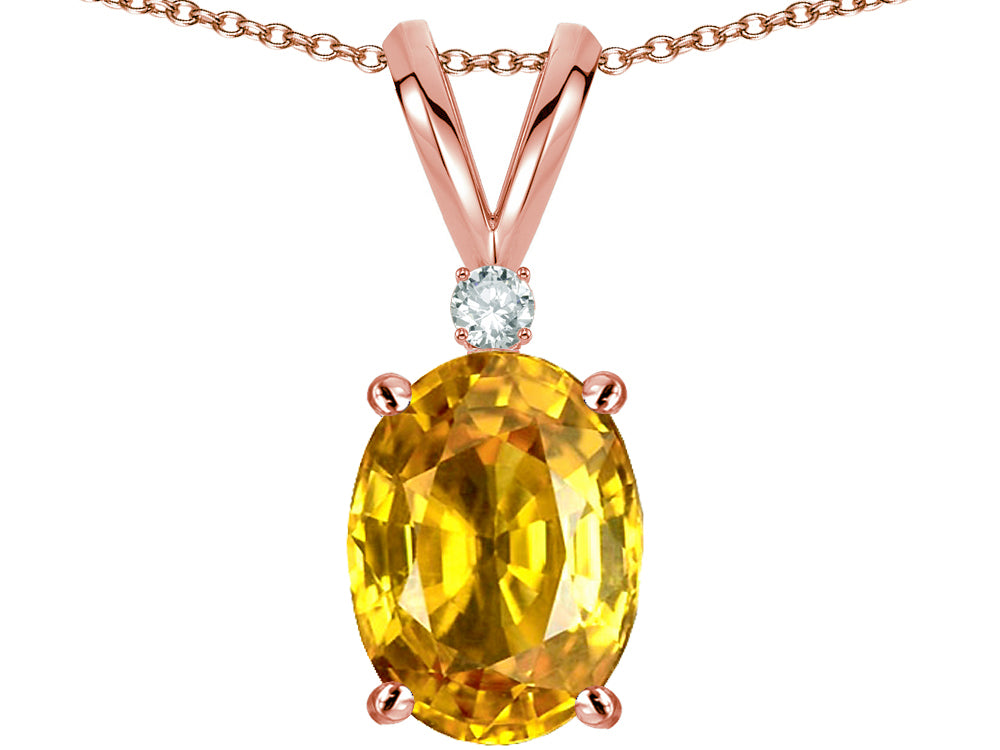Star K™ Oval 8x6mm Genuine Yellow Orange Sapphie Rabbit Ear Pendant Necklace