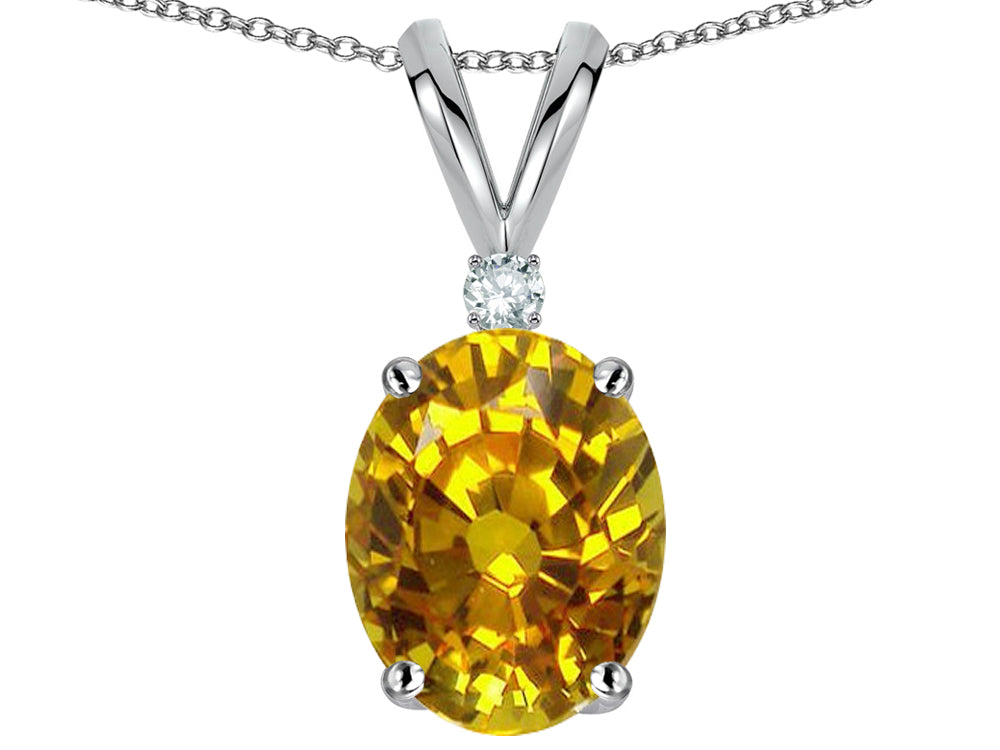 Star K™ Oval 8x6mm Genuine Yellow Orange Sapphie Rabbit Ear Pendant Necklace