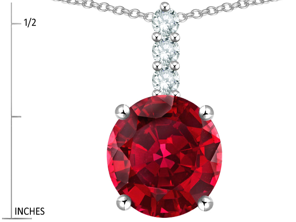 Star K ™ 7mm Round Created Ruby Three Stone Pendant Necklace