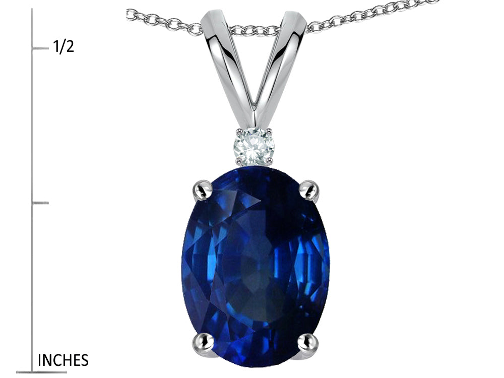 Star K Oval 8x6mm Created Sapphire Rabbit Ear Pendant Necklace
