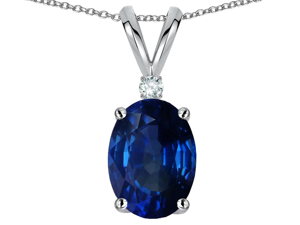 Star K Oval 8x6mm Created Sapphire Rabbit Ear Pendant Necklace