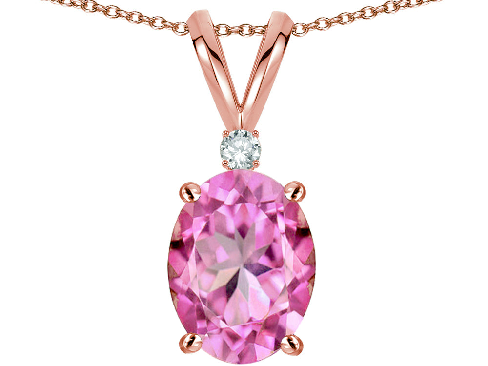 Star K Oval 8x6mm Created Pink Sapphire Rabbit Ear Pendant Necklace