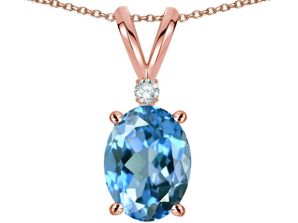 Star K Oval 8x6mm Genuine Blue Topaz Rabbit Ear Pendant Necklace