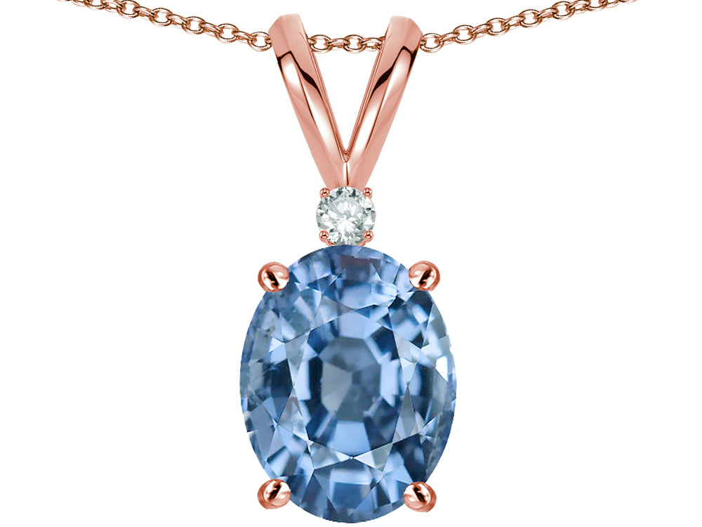 Star K Oval 8x6mm Simulated Aquamarine Rabbit Ear Pendant Necklace