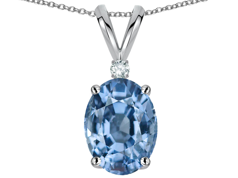 Star K Oval 8x6mm Simulated Aquamarine Rabbit Ear Pendant Necklace