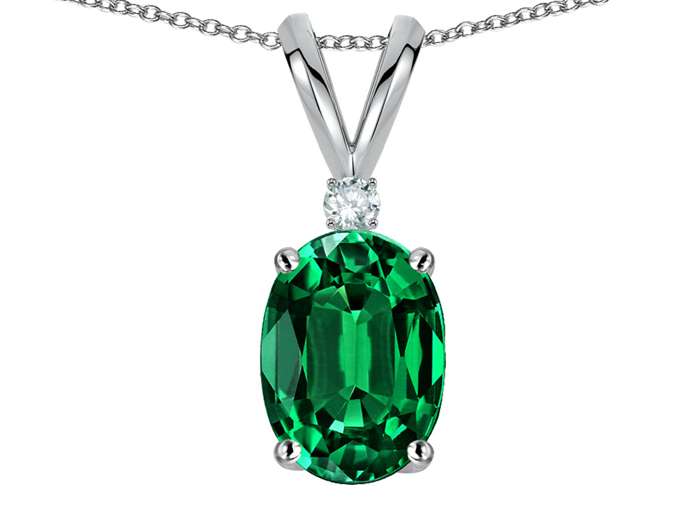 Star K Oval 7x5mm Simulated Emerald Pendant Necklace