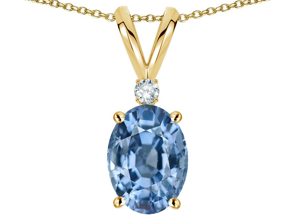 Star K Oval 7x5mm Simulated Aquamarine Classic Rabbit Ears Pendant Necklace