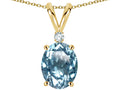 Star K Oval 8x6mm Genuine Sky Blue Topaz Rabbit Ear Pendant Necklace