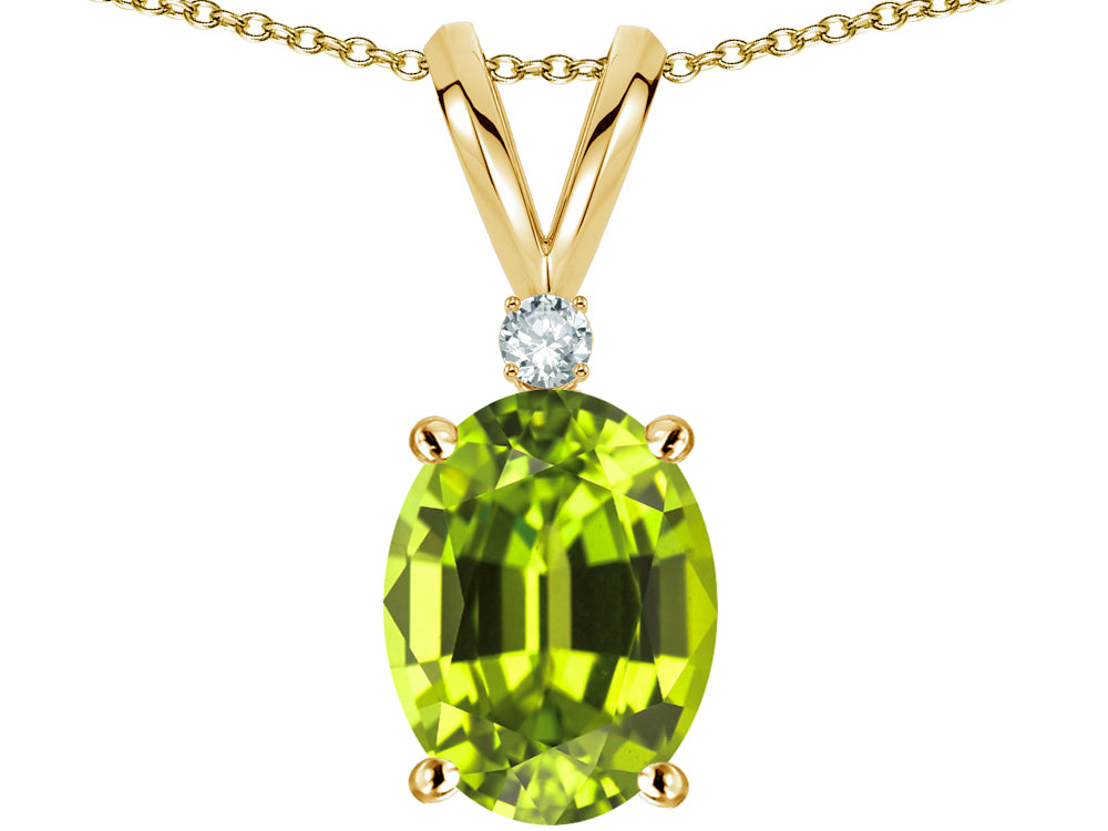 Star K Oval 8x6mm Genuine Peridot Rabbit Ear Pendant Necklace