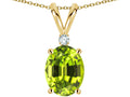 Star K Oval 8x6mm Genuine Peridot Rabbit Ear Pendant Necklace