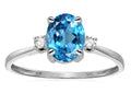 Star K™ Oval 8x6mm Genuine Blue Topaz Engagement Promise Ring