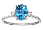Star K™ Oval 8x6mm Genuine Blue Topaz Engagement Promise Ring