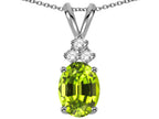Star K Oval 8x6mm Genuine Peridot Rabbit Ear Pendant Necklace