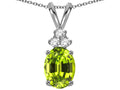 Star K Oval 8x6mm Genuine Peridot Rabbit Ear Pendant Necklace