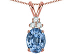 Star K Oval 8x6 mm Simulated Aquamarine Rabbit Ear Pendant Necklace