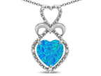 Star K 10k Gold Heart Shape 8mm Blue Created Opal Heart Halo Embrace Pendant Necklace