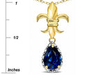 Star K  Pear Shape 8x6mm Created Sapphire Fleur De Lis Pendant Necklace 10k Yellow Gold