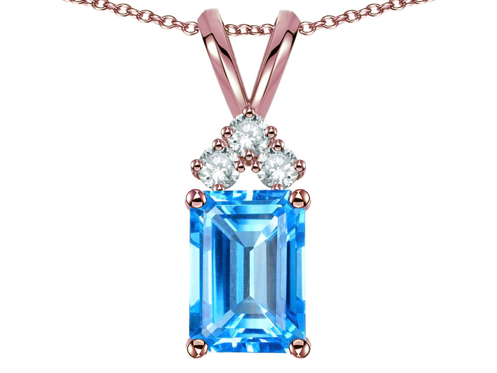 Star K Classic Emerald Octagon Cut 8x6mm Genuine Blue Topaz Rabbit Ear Pendant Necklace
