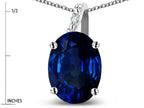 Star K  Oval 9x7 Created Sapphire Journey Pendant Necklace