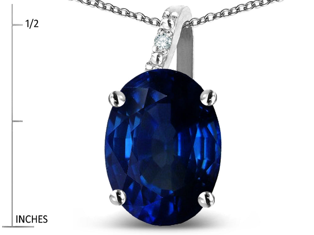 Star K  Oval 9x7 Created Sapphire Journey Pendant Necklace