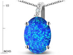 Star K  Oval 9x7 Created Blue Opal Journey Pendant Necklace