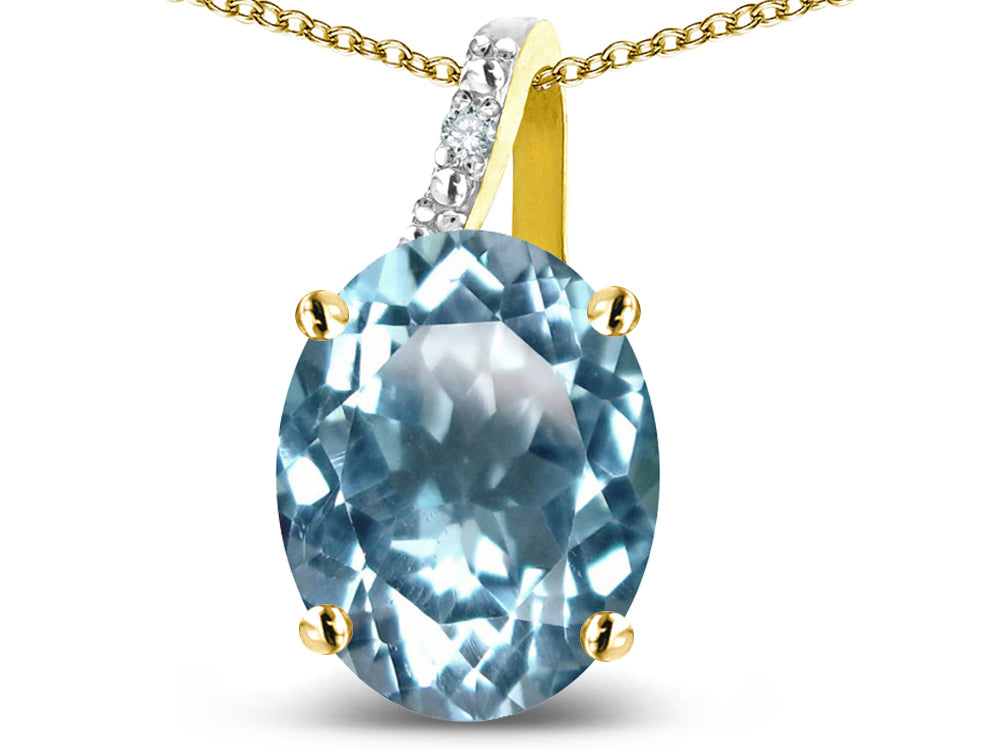 Star K 10k Gold Oval 9x7 Genuine Sky Blue Topaz Journey Pendant Necklace