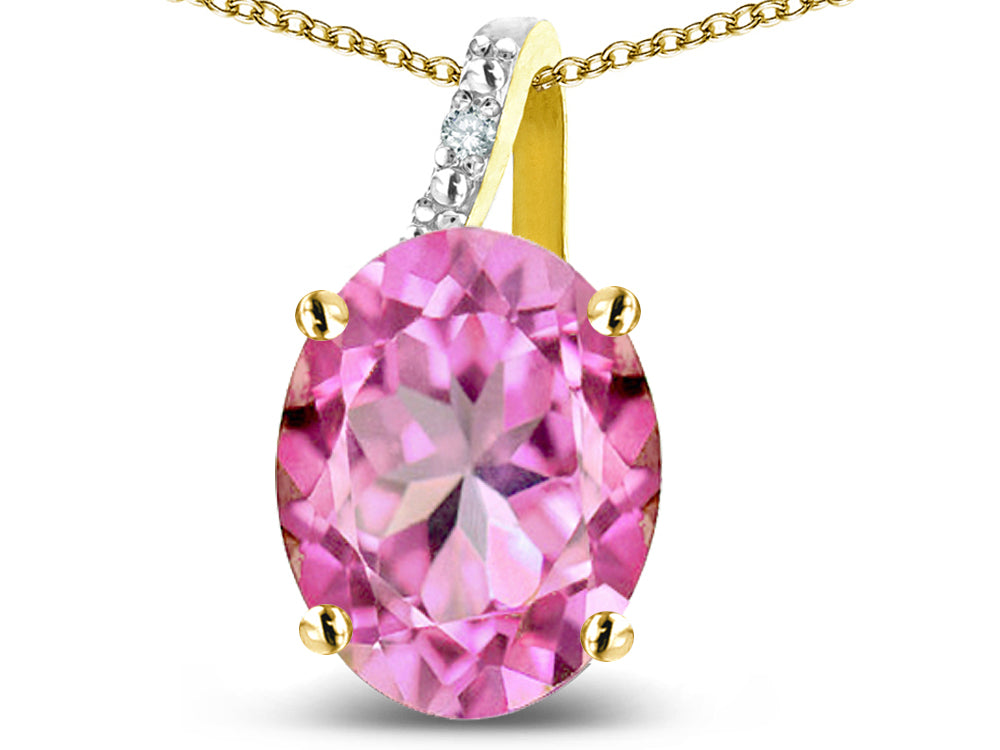 Star K 10k Gold Oval 9x7 Created Pink Sapphire Journey Pendant Necklace