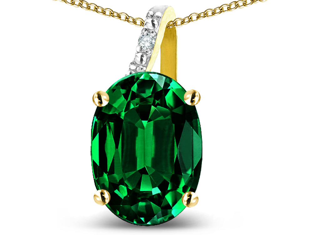 Star K  Oval 9x7 Simulated Emerald Journey Pendant Necklace