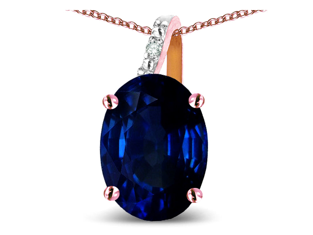 Star K Oval 8x6 Created Sapphire Journey Pendant Necklace