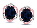 Star K ™ Large Love Knot Earrings with Oval 8 x 6mm Genuine Sapphire